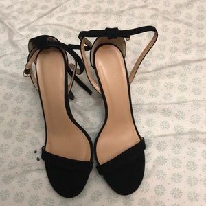 Black single strap heels